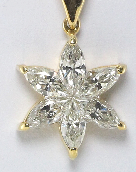 18k yellow gold marquise cut invisible setting 1.14 carat diamond flower pendant with J color grade and VS clarity